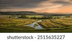 High angle view of Missouri River floodplain turned into wildlife conservation area early in autumn at sunset