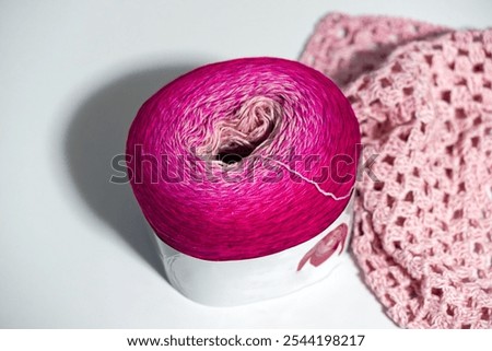 High angle view of multi colored ball with cotton fibre and polyacrylic mix agains white background. Photo taken November 12th, 2024, Zurich, Switzerland.