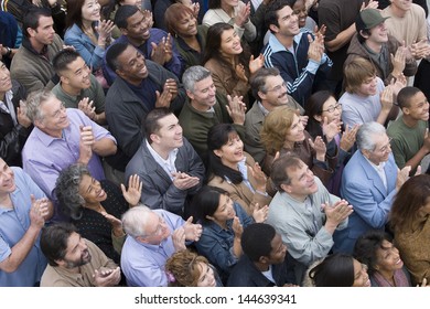 High Angle View Of Multiethnic People Clapping Together