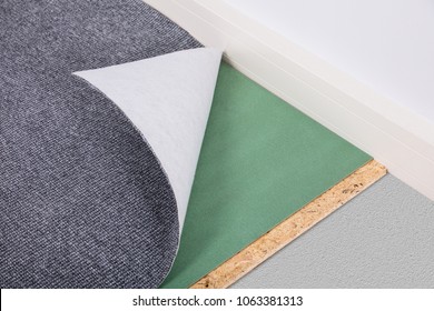 High Angle View Of A New Grey Carpet On Floor