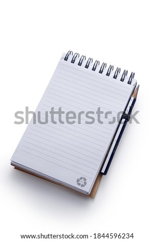 High Angle View Of Note Pad With Pencil On White Background                               