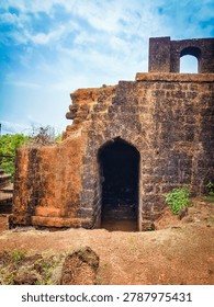 High angle view of an old arched passageway and stone steps in Mirjan Fort.