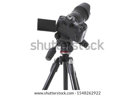 High angle view on massive black still-shot camera on trepied isolated