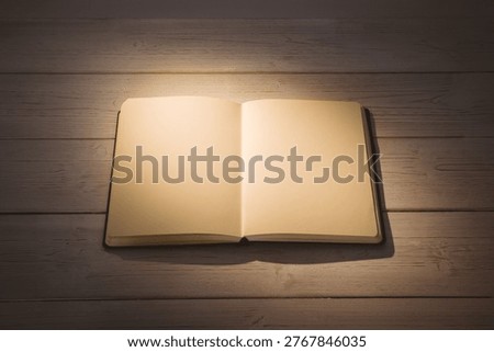 High angle view of open book on table