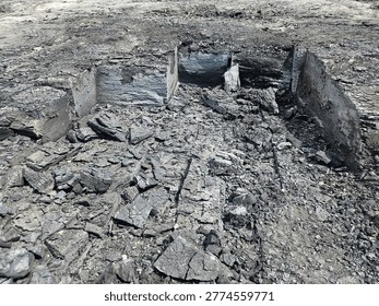 High Angle View of an Open Pit Coal Mine with Excavated Layers and Mineral Debris