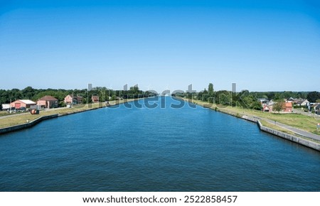 High angle view over the Albert canal with industry and nature, Stokrooie, Hasselt, Belgium
