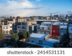 High angle view over backyards and residential houses covered with snow, Jette, Brussels, Belgium