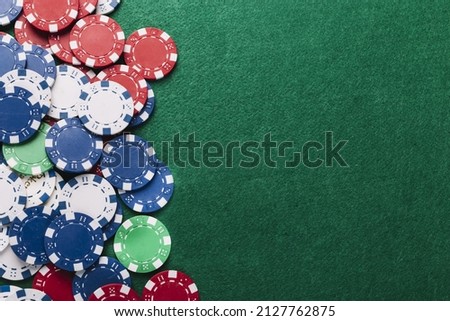 high angle view poker chips green table