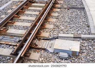 High angle view of railway track with gravel and concrete railway sleepers at Swiss railway station Zürich Altstetten on an autumn day. Photo taken November 11th, 2024, Zurich, Switzerland. - Powered by Shutterstock