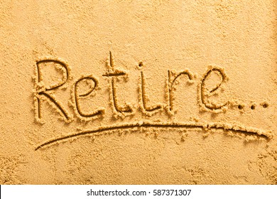 High Angle View Of A Retirement Concept Written On Sandy Beach