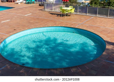 High Angle View Of Round Swimming Pool.