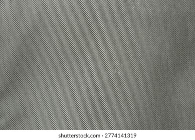 High angle view of a silver metallic woven mesh texture pattern