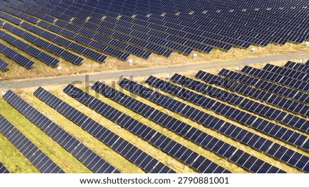 High angle view of solar panels generating renewable energy in a rural Australian landscape.