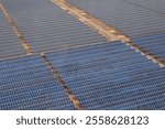 High angle view of solar power collector plates in rows on the earth of Bungeoseom Islet at Chuncheon-si, South Korea
