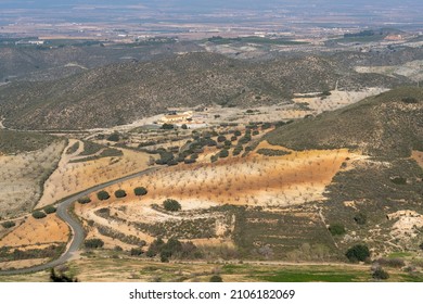 A High Angle View Of Spanish Desert Landscape With Fields Of Almond Trees