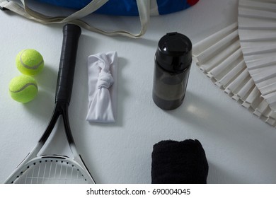 High angle view of sports supplies on white background - Powered by Shutterstock