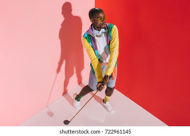 high angle view of stylish african american man playing golf  - Shutterstock ID 722961145