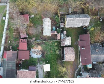 High angle view of tiny houses and gardens