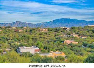 High Angle View Of Upper Middle Class Residence In Tucson, Arizona. Mountainside Houses With Mediterranean Design Exterior Surrounded By Plants And Trees.