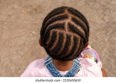 High angle view of young girl with braided hair - Shutterstock ID 2135650659