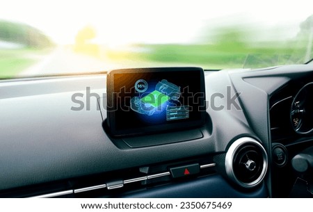 The high battery capacity symbol is displayed on the screen in the EV electric car. EV car battery is fully charged while traveling. Concept of Battery and electric car vehicle technology.