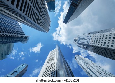 High Building Financial Business Area With Cloud Blue Sky,look Up View,blue Business Tone