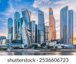 High buildings of Moscow-City at Moskva River at summer sunset, Russia. Moscow-City is business district in Moscow. Panorama of modern office buildings at summer sumset, Moscow downtown in summer.