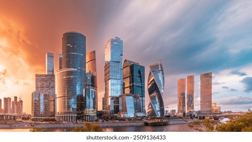 High buildings of Moscow-City at Moskva River at summer sunset, Russia. Moscow-City is business district in Moscow. Panorama of modern office buildings at summer sumset, Moscow downtown in summer.