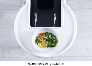 High Chair With Healthy Baby Food Served On White Tray Indoors, Top View