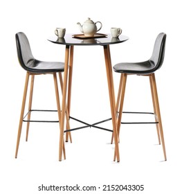 High chairs with table, teapot and cups on white background - Powered by Shutterstock