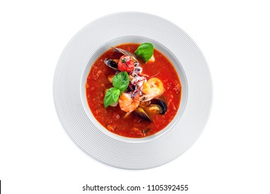 High Class Healthy Italian Meal On A Table. Tomato Soup With Seafood In A Plate. Isolated On White. Top View Shot.