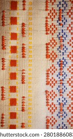 High contrast color image emphasizing the spectacular artistic layout and time honored craftsmanship of native handwoven Ulos clothing