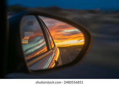 High contrast higway landscape scene from rearview mirror car, chubut province, patagonia, argentina - Powered by Shutterstock