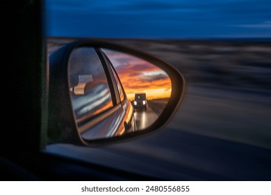 High contrast higway landscape scene from rearview mirror car, chubut province, patagonia, argentina - Powered by Shutterstock