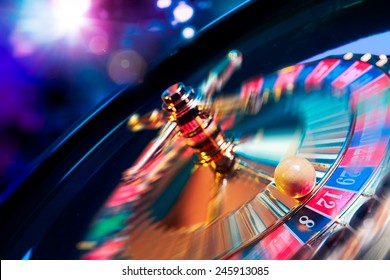 high contrast image of casino roulette in motion - Shutterstock ID 245913085
