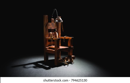 High contrast image of an electric chair scale model on a dark backgorund