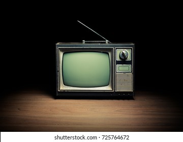 High Contrast Image Of An Old Vintage TV On White Wood.