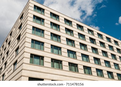 High Contrasted Office House With Darken Clouds