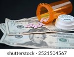 High Cost of Prescription Drugs. US Money with medicine. High Cost of Medicine and Healthcare. Healthcare, medical or drug abuse. High Cost of Prescription Drugs. High Price of Prescription Medication