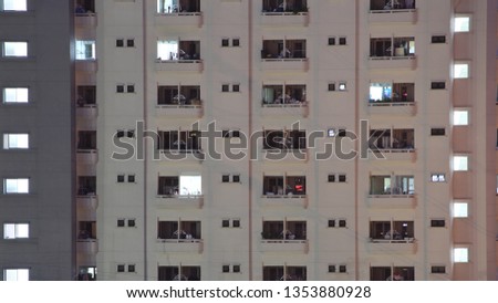 High density apartment. building elevation a reinforced concrete residential architecture. hi-rise multiple floor dormitory with small window and balcony in each room.