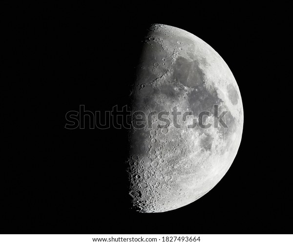 High detail photo of\
the Moon at 1600mm focal length on a clear sky night, first quarter\
phase, half lit