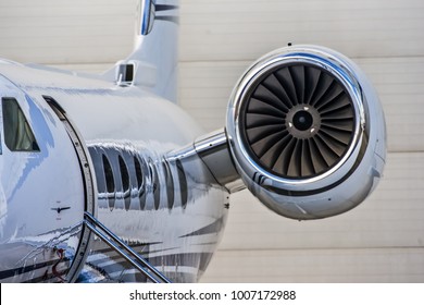 High Detailed Closeup View On Small White Private Business Jet Windows Engine