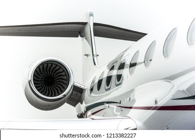 High Detailed Closeup View On Small White Private Business Jet Windows Engine