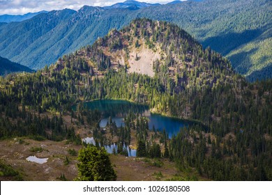 High divide backpacking trail mount olympus olympic national park hiking landscape photography lake beautiful vista scenic mountains pine trees blue sky snow capped background wallpaper desktop 