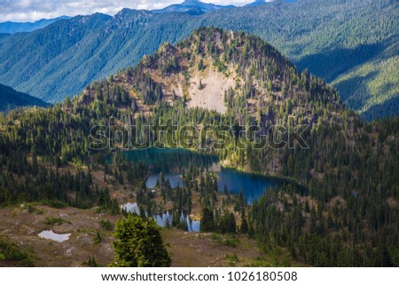 High divide backpacking trail mount olympus olympic national park hiking landscape photography lake beautiful vista scenic mountains pine trees blue sky snow capped background wallpaper desktop 