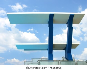 High Diving Board At A Public Swimming Pool.