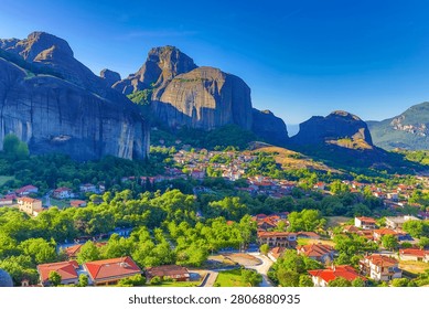 High dynamic range HDR landscape view of Meteora in central Greece, showcasing dramatic sandstone rock pillars rising above the Thessalian plain. The scene captures the unique geological formations topped with historic Orthodox monasteries, blending natural rock architecture with centuries-old spiritual heritage. Enhanced HDR detail reveals rich textures in the cliffs, valleys, and surrounding vegetation under dynamic lighting conditions. Meteora is a UNESCO World Heritage Site and one of Greece’s most iconic landscapes, known for its striking vertical rock formations and monastic settlements. The image emphasizes depth, contrast, and atmosphere, making it ideal for themes of travel, tourism, nature, geology, culture, and landscape photography
