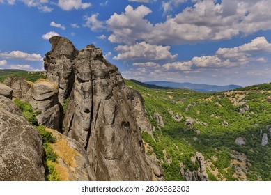 High dynamic range HDR landscape view of Meteora in central Greece, showcasing dramatic sandstone rock pillars rising above the Thessalian plain. The scene captures the unique geological formations topped with historic Orthodox monasteries, blending natural rock architecture with centuries-old spiritual heritage. Enhanced HDR detail reveals rich textures in the cliffs, valleys, and surrounding vegetation under dynamic lighting conditions. Meteora is a UNESCO World Heritage Site and one of Greece’s most iconic landscapes, known for its striking vertical rock formations and monastic settlements. The image emphasizes depth, contrast, and atmosphere, making it ideal for themes of travel, tourism, nature, geology, culture, and landscape photography