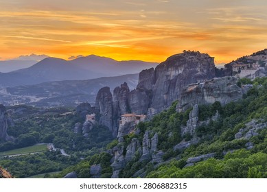 High dynamic range HDR landscape view of Meteora in central Greece, showcasing dramatic sandstone rock pillars rising above the Thessalian plain. The scene captures the unique geological formations topped with historic Orthodox monasteries, blending natural rock architecture with centuries-old spiritual heritage. Enhanced HDR detail reveals rich textures in the cliffs, valleys, and surrounding vegetation under dynamic lighting conditions. Meteora is a UNESCO World Heritage Site and one of Greece’s most iconic landscapes, known for its striking vertical rock formations and monastic settlements. The image emphasizes depth, contrast, and atmosphere, making it ideal for themes of travel, tourism, nature, geology, culture, and landscape photography