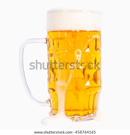 High dynamic range (HDR) Large German bierkrug beer mug tankard glass of Lager - isolated over white background